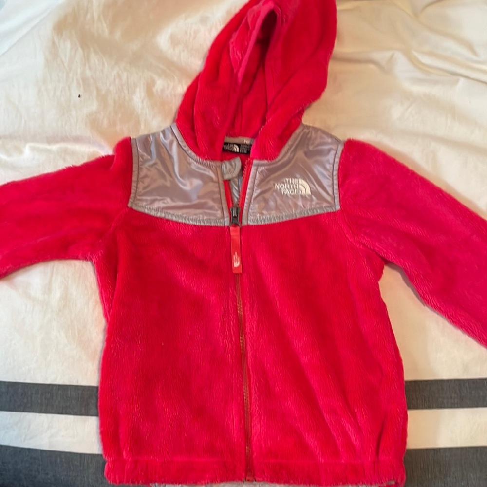 Hot pink north face fleece coat.
